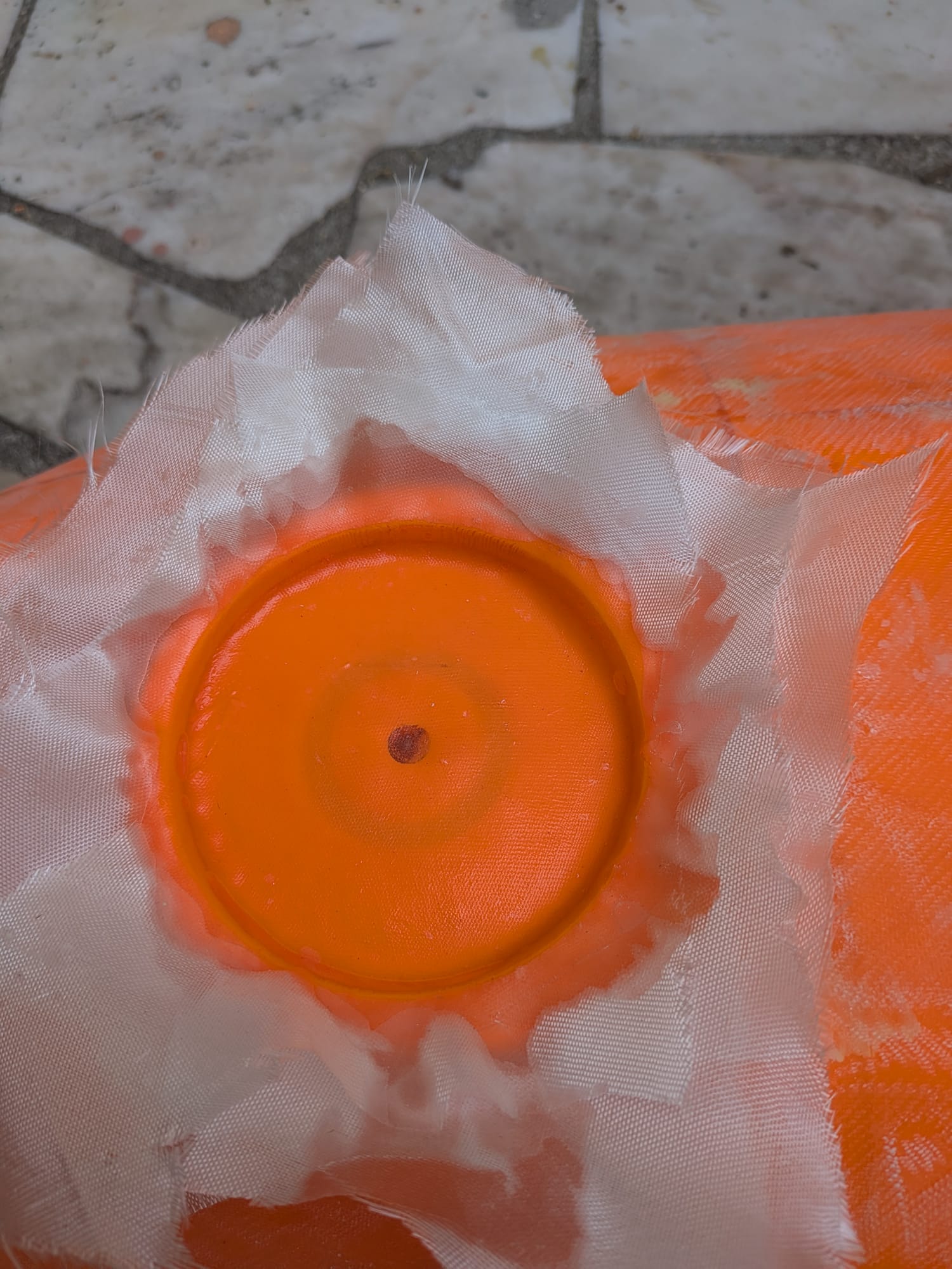Trimming and sanding the cured fiberglass