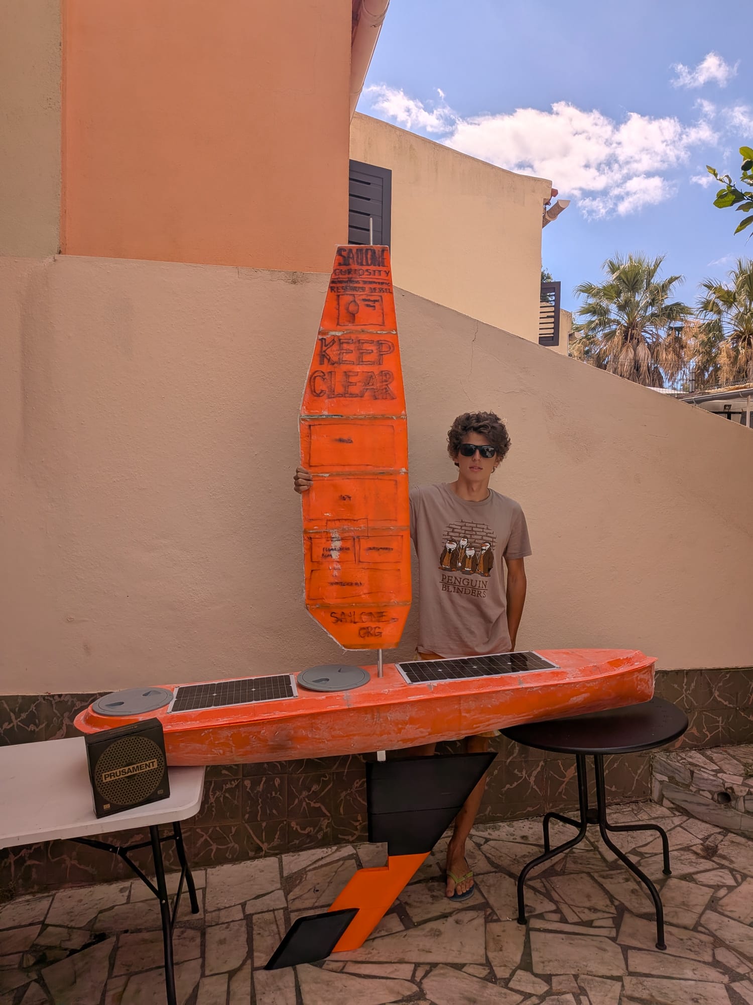 Ivan with the completed hull and sail